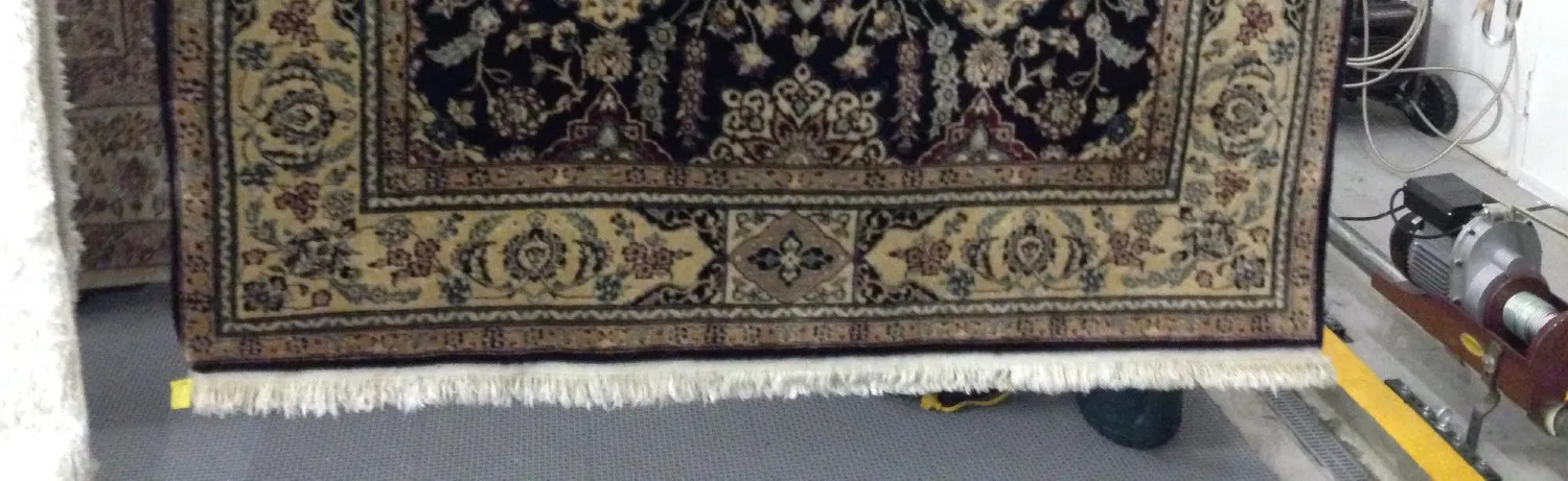 A rug drying quickly under controlled airflow inside our plant